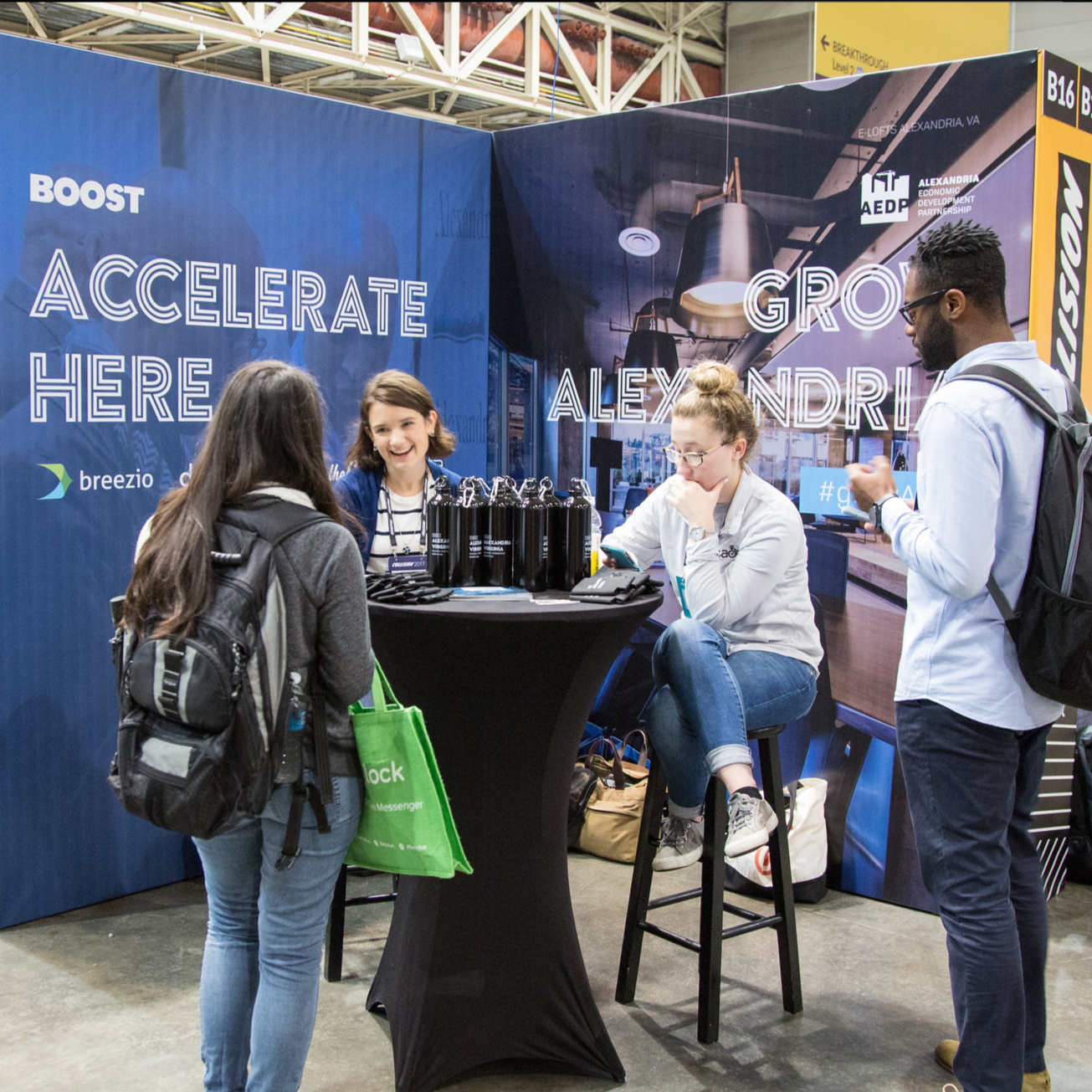 small business at trade show with marketing agency help to capture new customers
